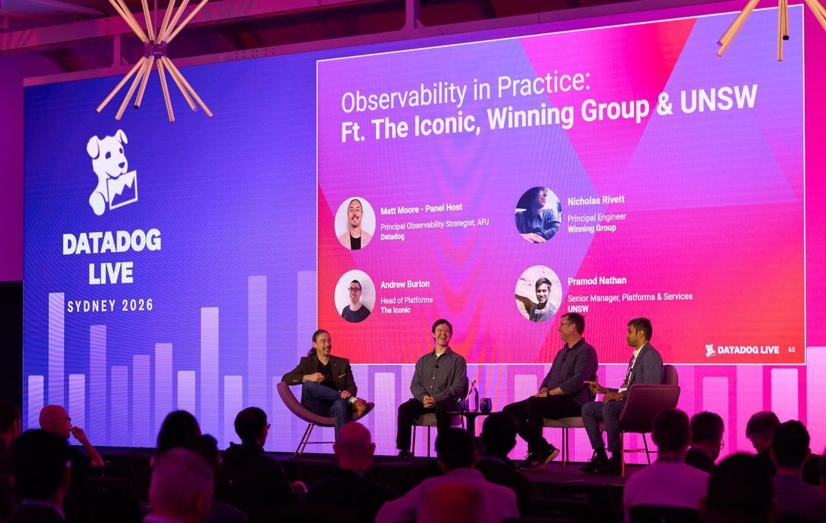 Customer panel on stage at Datadog Live Sydney, at the W Sydney on Darling Harbour